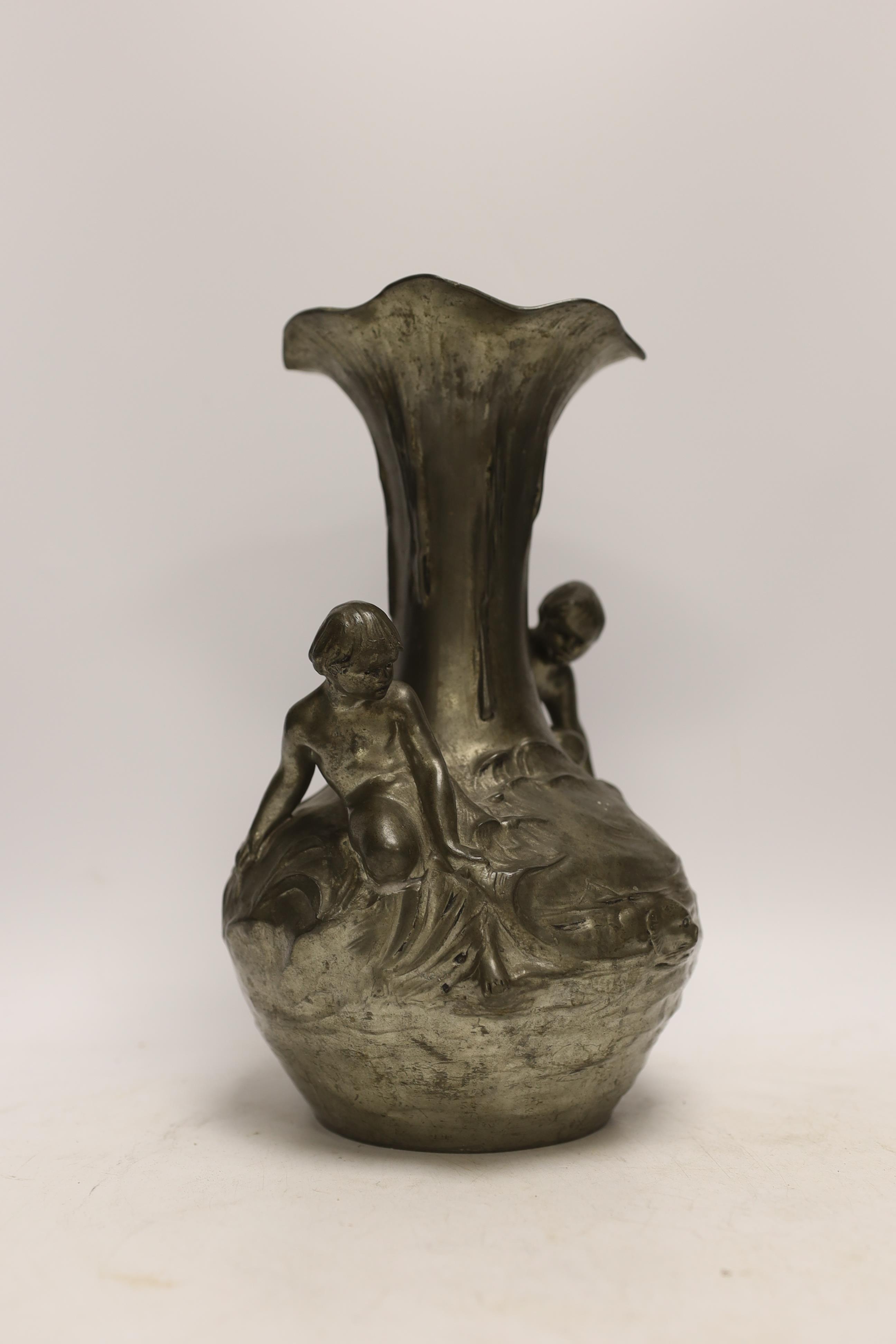 An Art Nouveau Kayserzinn pewter vase and two similar Etan Garanti pewter ewers, signed ‘H. Huppe’ and ‘Petiz’, tallest 27cm